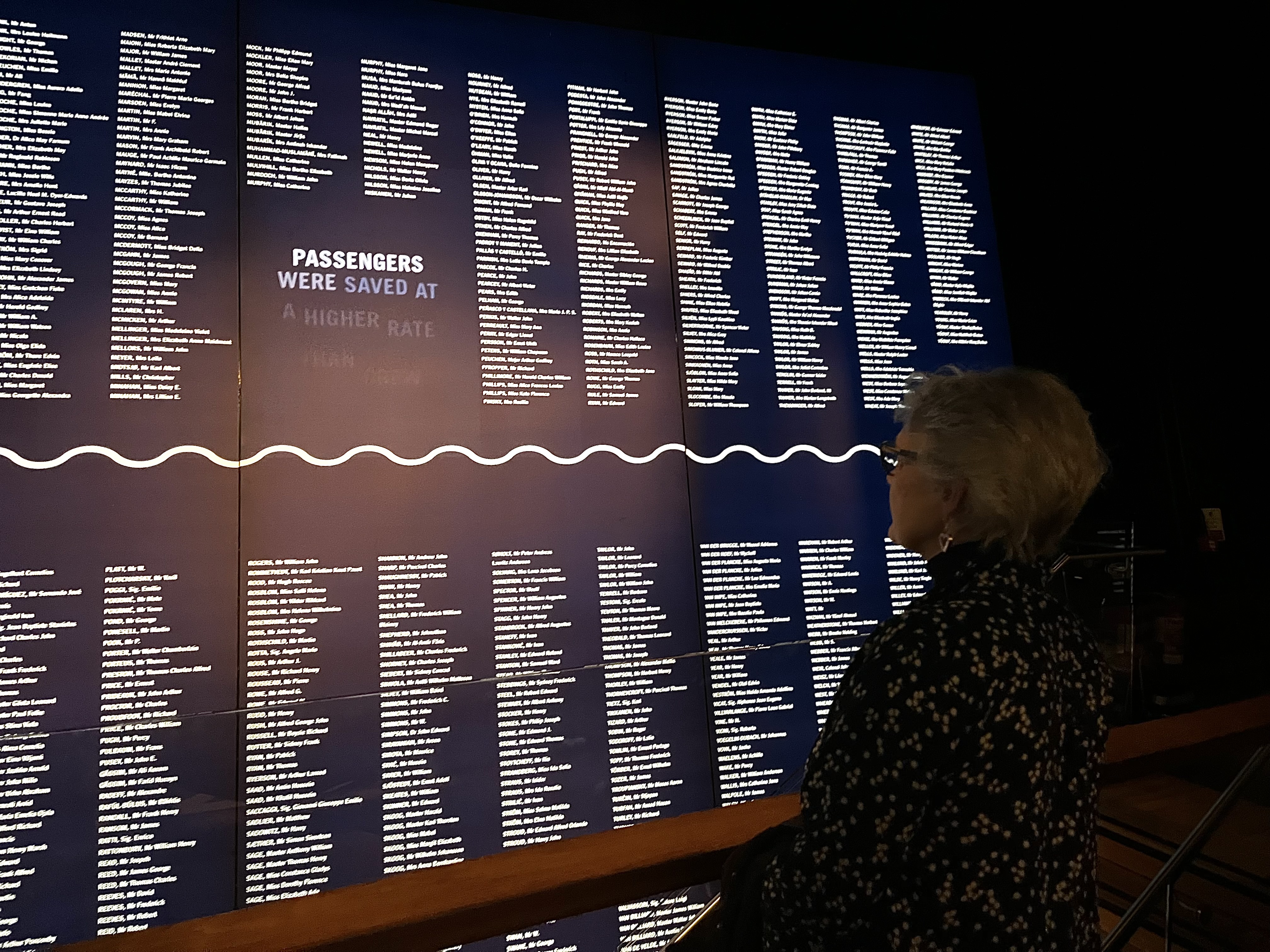 Angela Young at the wall of names