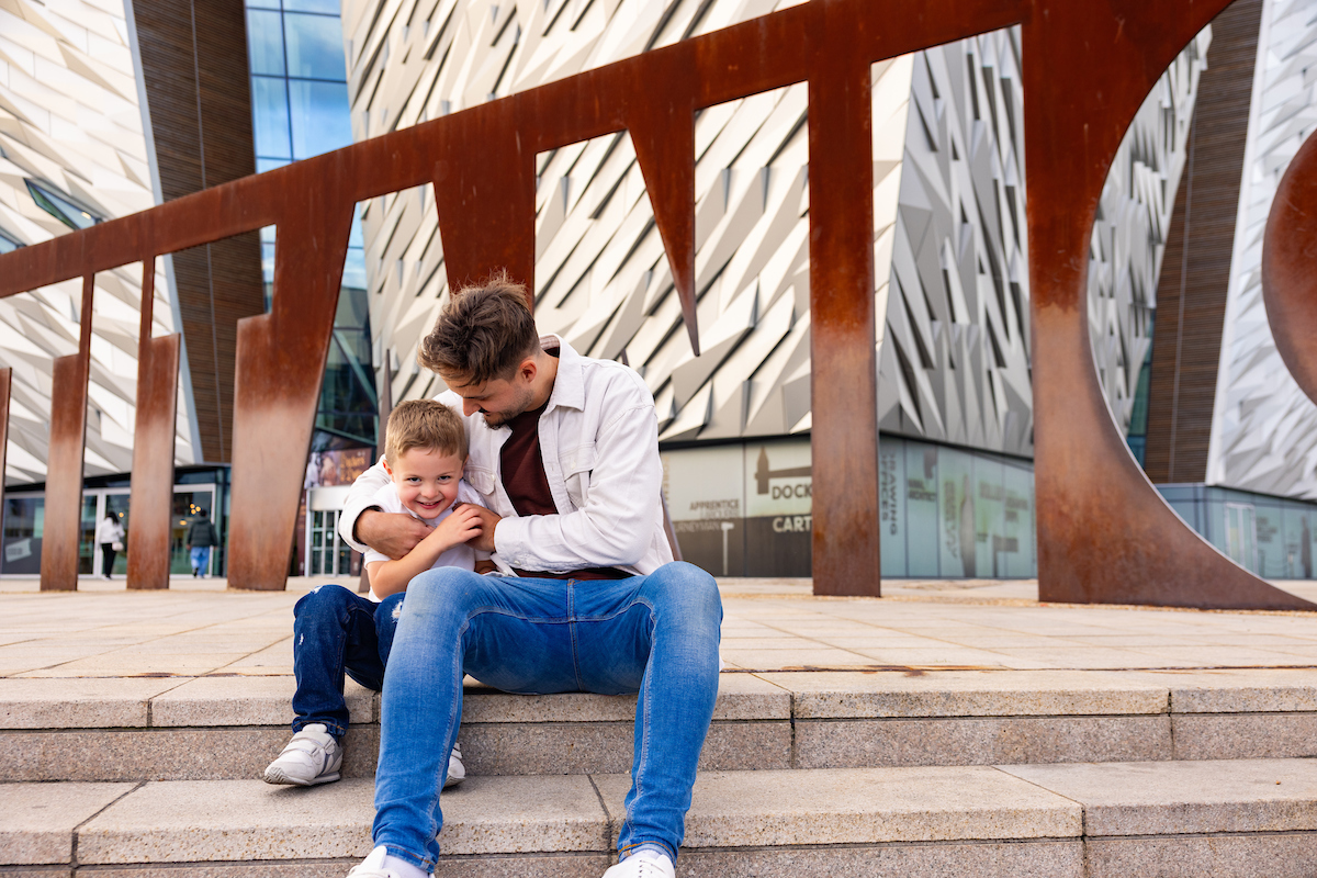Family photo at Titanic sign